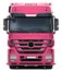 Full pink truck Mercedes Actros front view.