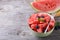 Full plate of sliced â€‹â€‹pieces of ripe watermelon with blueberries