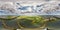 full seamless aerial spherical hdri 360 panorama view over farm field of solar panels with overcast sky and white clouds in