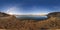 Full seamless panorama 360 angle view near quarry flooded with water for sand extraction mining in the evening sun in