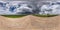 Full seamless spherical hdri panorama 360 degree angle view on no traffic gravel road among fields with overcast sky before storm