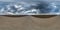 Full seamless spherical hdri panorama 360 degrees angle view on gravel road among fields in spring day with storm clouds before