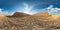 Full seamless spherical hdri panorama 360 degrees angle view among harvested field with huge straw pile of Hay roll bales  in