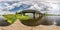 Full seamless spherical hdri panorama 360 degrees angle view on wooden pier of shore of wide river near bridge in sunny day with