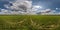 Full seamless spherical hdri panorama 360 among green farming fields in summer day with awesome clouds in equirectangular