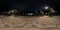 Full seamless spherical night panorama 360 degrees angle view on an empty pedestrian street with street lights in equirectangular