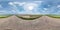 Full seamless spherical panorama 360 by 180 degrees angle view on the old asphalt road among fields in sunny summer day with halo