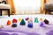 a full set of chakra stones placed on a white carpet