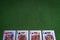 Full set of King Playing cards on green felt background