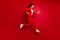 Full side profile side photo of cheerful lady running having bright pomade isolated over red background