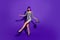 Full size photo of cheerful youth hold mirror ball glow glitter move wear eyeglasses eyewear  over purple violet