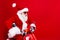 Full size photo of crazy grandfather wear trendy santa costume glasses ride on moped look empty space isolated on red