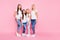 Full size photo of different age ladies standing close wear casual outfit isolated pink background