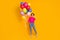 Full size photo of ecstatic girl hold balloons win raise fists wear pullover isolated bright color background