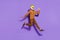 Full size photo of excited freaky sloth mask guy jumping have fun isolated on purple color background