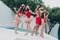 Full size photo of excited group of senior man girls dance romantic date poolside hotel trip xmas outdoors