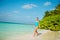 Full size photo of fit tender charming lady go walk sand coast exotic island resort wear blue bodysuit