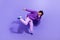 Full size photo of funny funky satisfied positive person wear violet hoodie pants dancing having fun isolated on purple