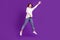 Full size photo of good mood funky funny girl jumping catch product advertisement isolated on violet color background