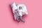 Full size photo of nice lady jump throw pillow up blanket flight slumber party open mouth wear sleep mask white t-shirt