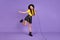 Full size photo of nice optimistic brunette hairdo girl dance sing in mic wear cap t-shirt skirt isolated on lilac