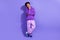 Full size photo of ponder pensive person wear violet hoodie sport pants look at empty space offer isolated on purple