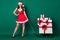 Full size photo pretty lovely fancy girl santa claus cap enjoy deliver pull pile stack giftbox x-mas tradition newyear