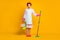 Full size photo of sad girl hold bucket bottle spray mop wear gloves bath robe isolated shine color background