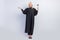 Full size photo of serious old woman hold hand empty space hammer court judge law isolated on grey color background