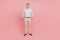 Full size photo of serious young man hold hands pockets confident formalwear isolated on pink color background