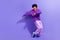 Full size photo of stylish positive person wear violet hoodie pants dancing modern hip hop music isolated on purple