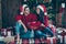 Full size photo of two romantic spouses hold package follow noel tradition celebrate christmas time x-mas vacation sit