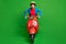 Full size photo of young beautiful happy smiling excited girl wear yellow helmet ride red moped  on green color