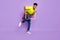 Full size photo of young handsome happy positive funky african man get out from frame isolated on purple color