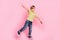 Full size photo of young little boy enjoy raise hands fly wings plane smile isolated on pink color background