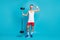 Full size photo of young sportsman happy smile proud show muscles barbell exercise wear wristband  over blue