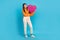 Full size portrait of adorable positive girl arms hold big heart collage isolated on blue color background