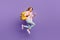 Full size profile photo of hooray pretty girl jump run wear pink shirt jeans sneakers rucksack isolated on violet