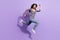 Full size profile side photo of happy funky smiling cheerful korean girl running fast in air  on violet color