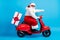 Full size profile side photo of stylish modern white grey hair bearded santa claus drive motor bike deliver x-mas