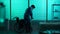 Full-sized silhouette video of a disabled man, patient with mobility impairment trying to get up from a wheelchair