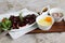 Full Slab BBQ Baby Back Ribs with sauce and salad served in a dish isolated on grey background side view