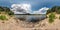 Full spherical seamless hdri panorama 360 degrees angle view on rocky shore of huge river in sunny summer day and windy weather