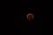 Full super wolf blood moon lunar eclipse, fully red