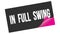 IN  FULL  SWING text on black pink sticker stamp