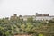 Full view at the Convent of Christ, Roman Catholic convent in Tomar, typical landscape with trees and grass, originally Templar