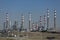 Full view at the industrial complex of oil refinery, with buildings, equipment and machinery, blue sky background, in LeÃ§a da Pal