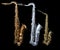 Full view of three saxophones standing