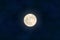 Full yellow moon with star isolated on dark night sky background. Closeup moon light effect. Glow mo