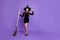 Fulle length photo of charming joyful woman witch conjure hold her broom want fly go to diabolic gathering sorcery magic